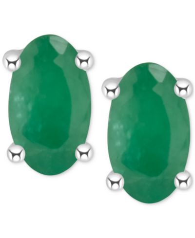 Серьги-гвоздики с овальной огранкой Ruby в белом золоте 14k