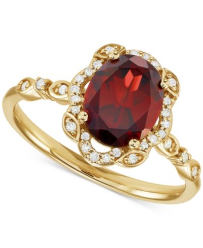 Кольцо с гранатом (2-1/4 ct. t.w.) и бриллиантом (1/8 ct. t.w.) в оправе Halo из золота 14k