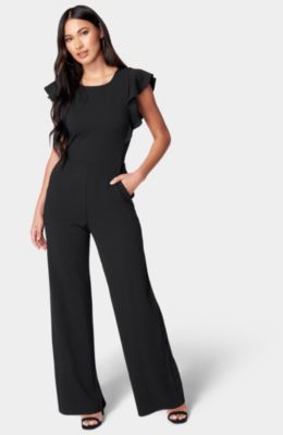 Комбинезон Bebe Женский Scuba Crepe с рюшем на рукаве