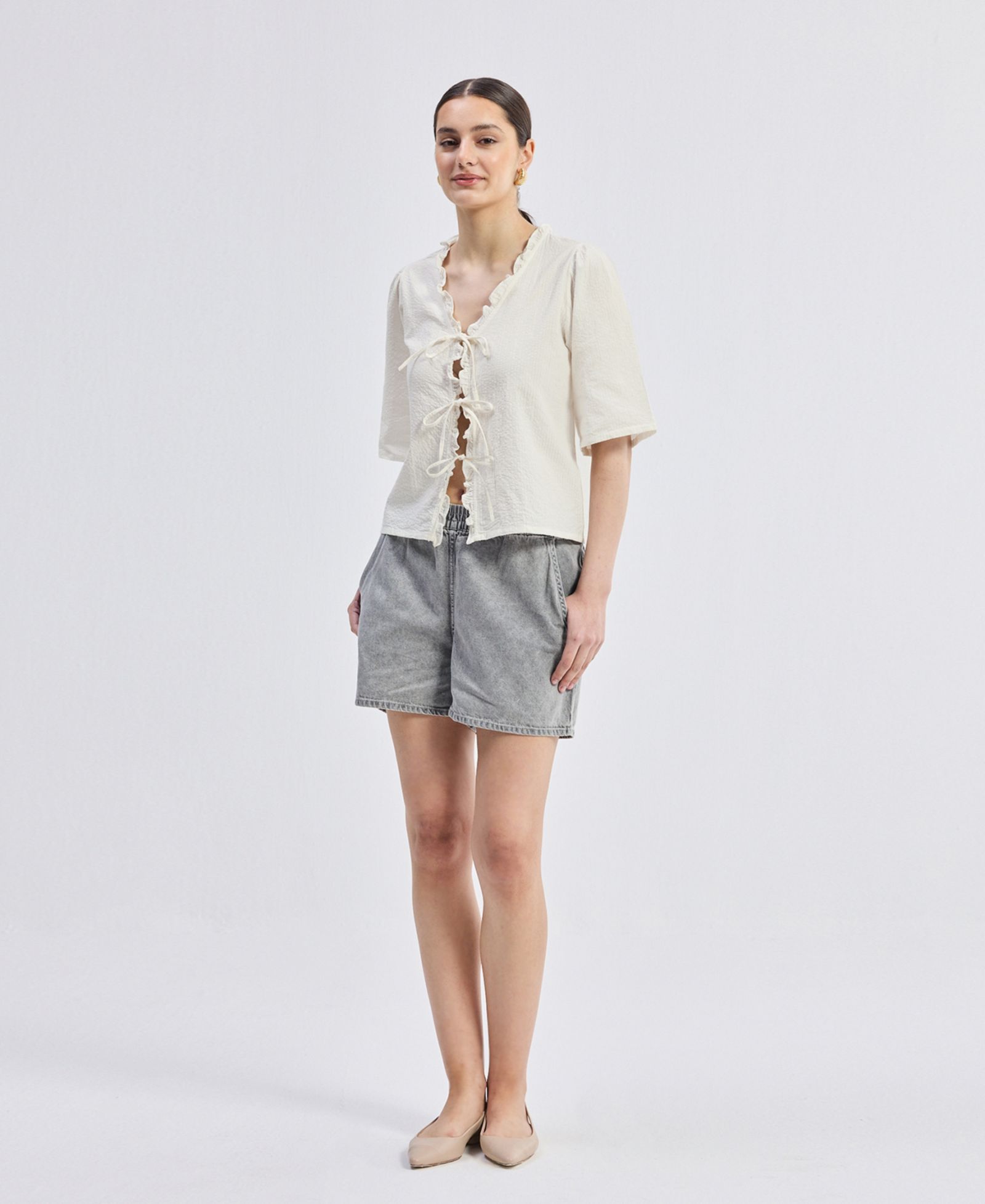 Reistor Women's Relaxed Fit Top With Ruffles and Front-Ties in Cream