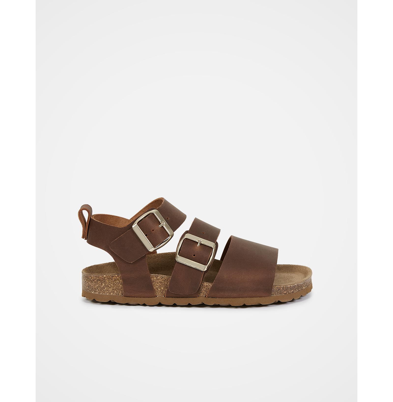 Celtic & Co. An elegant triple strap sandal