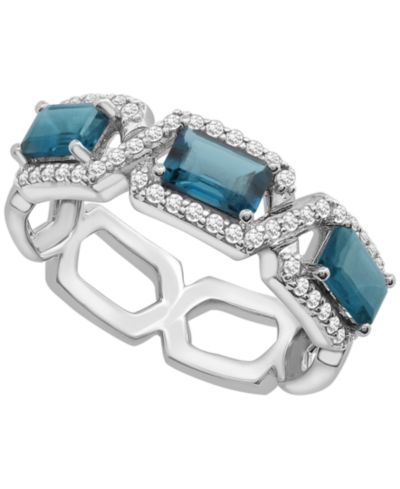 Кольцо в белом золоте 14k с синим топазом (1ct. t.w.) и бриллиантом (1/4 ct. t.w.)