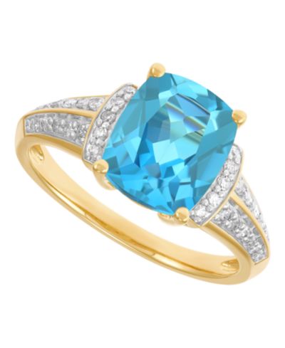 Кольцо с Blue Topaz и Diamond в золотом напылении на серебре 14k