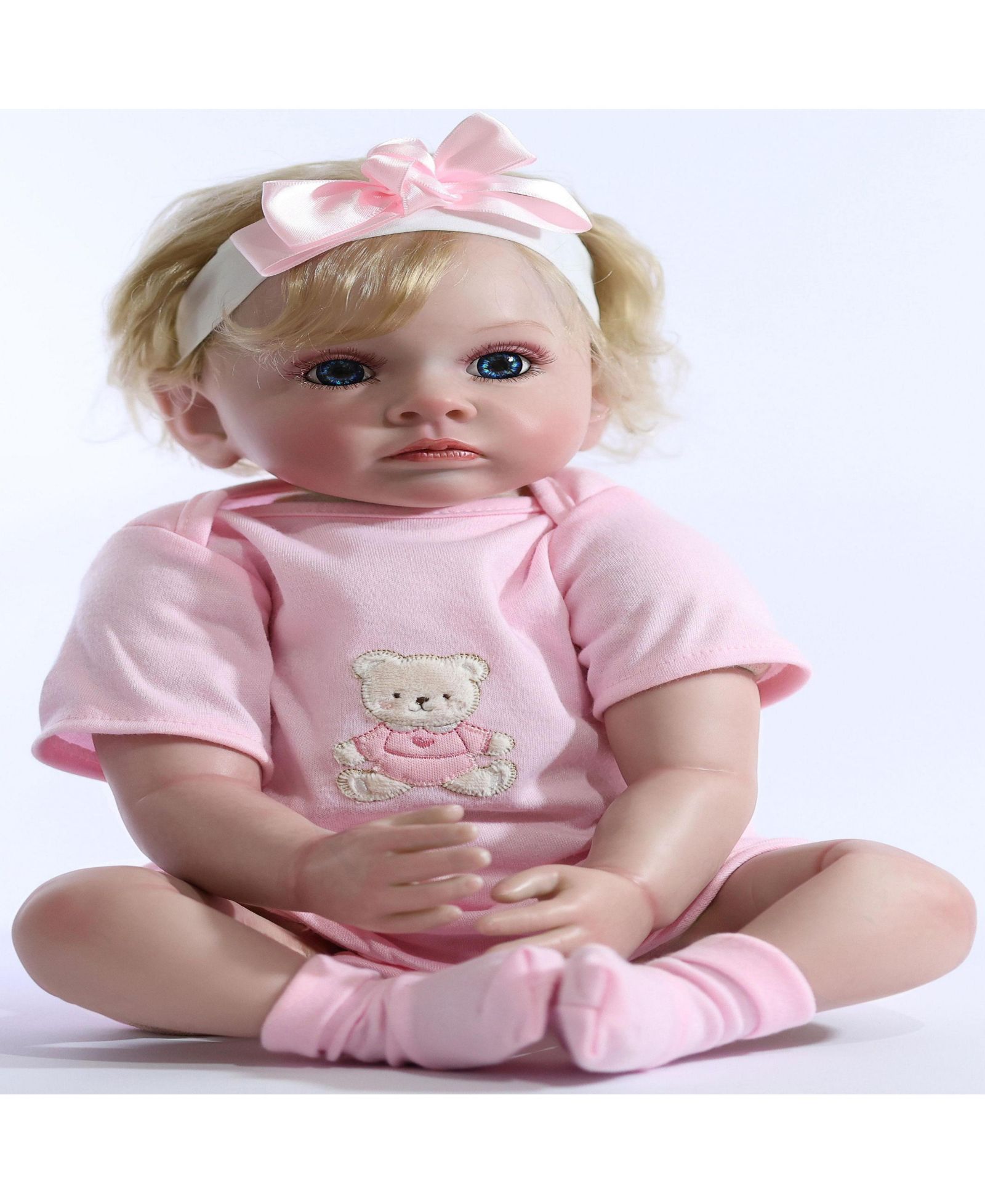 Кукла The New York Doll Collection reborn, 22 inch, с блондинистыми кудрявыми волосами