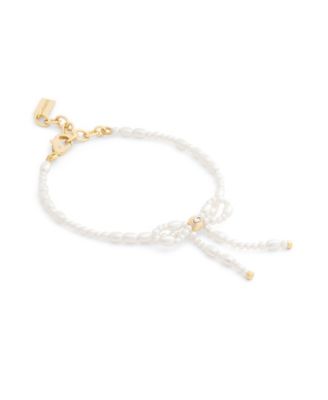 COACH Браслет с имитацией жемчуга и бантом Bow Strand