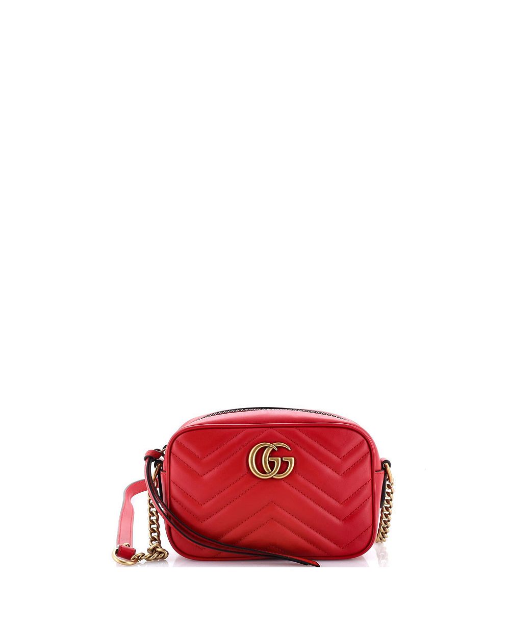 Б/у сумка Gucci Mini GG Marmont на плечо из стеганой кожи