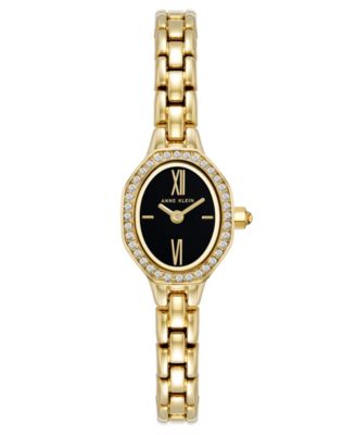 Женские кварцевые наручные часы Anne Klein с овальным черным циферблатом и золотистым корпусом 18mm