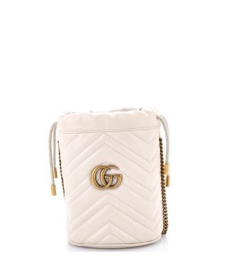 Б/у маленькая сумка-ведро Gucci Mini GG Marmont из стеганой кожи