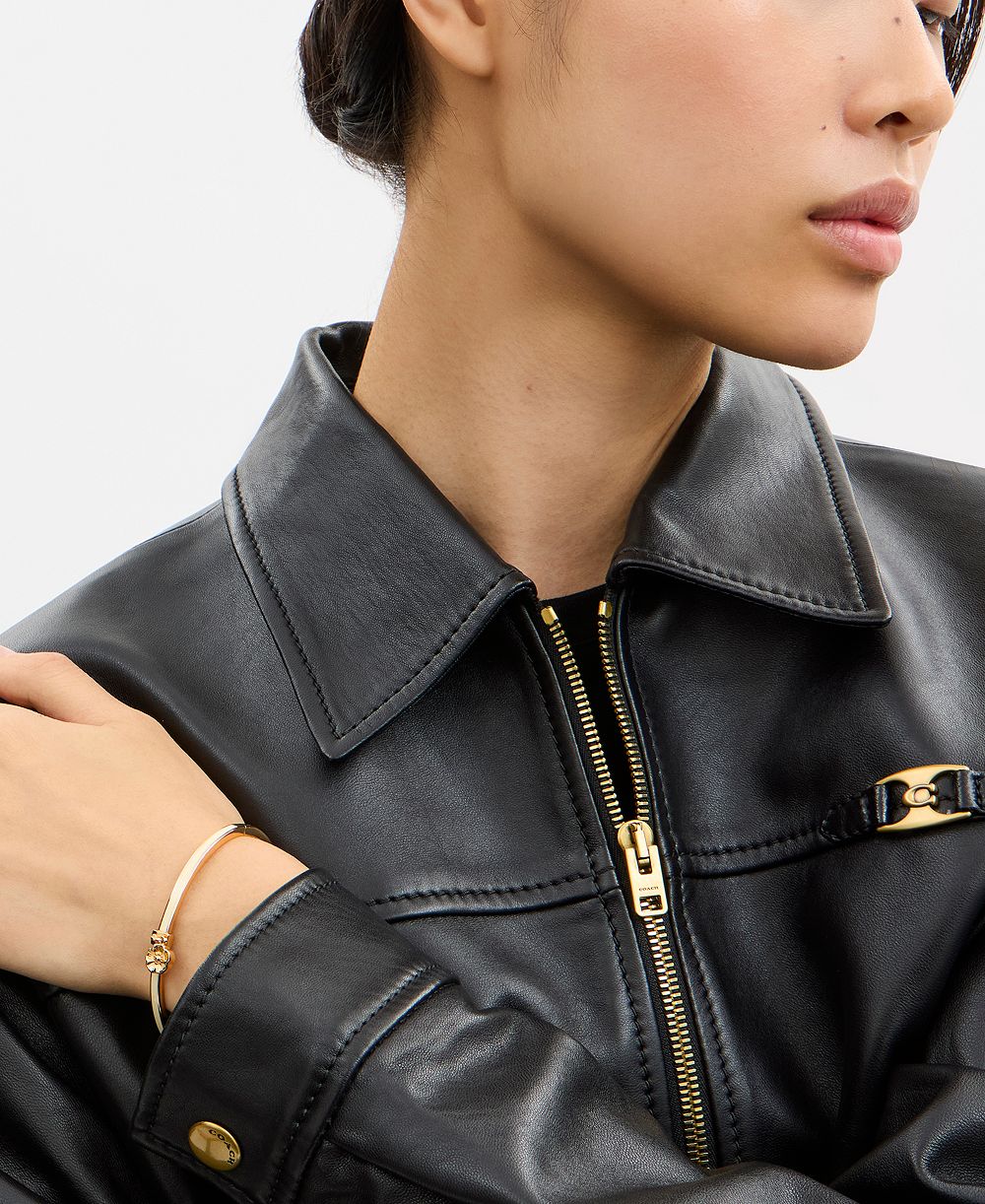 COACH Gold-Tone Rose Enamel Charm Bangle Bracelet