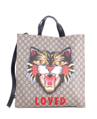 Gucci большая конвертируемая сумка-тоут для ноутбука с принтом GG из лакированной ткани