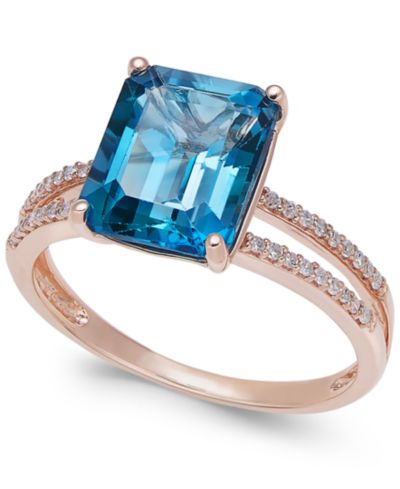 Кольцо с синим топазом London Blue и бриллиантами в золоте 14k