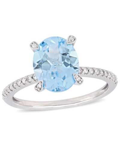 Кольцо с голубым топазом (3-3/4 ct.t.w.) и бриллиантом (1/10 ct.t.w.) в белом золоте 10k